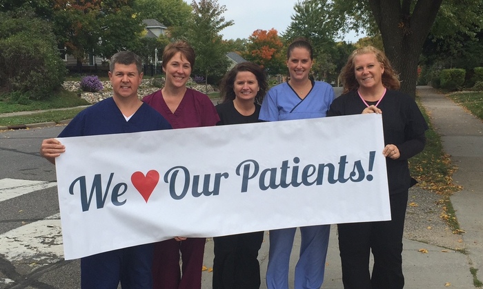 The Bomstad Dental team outside their Hopkins office